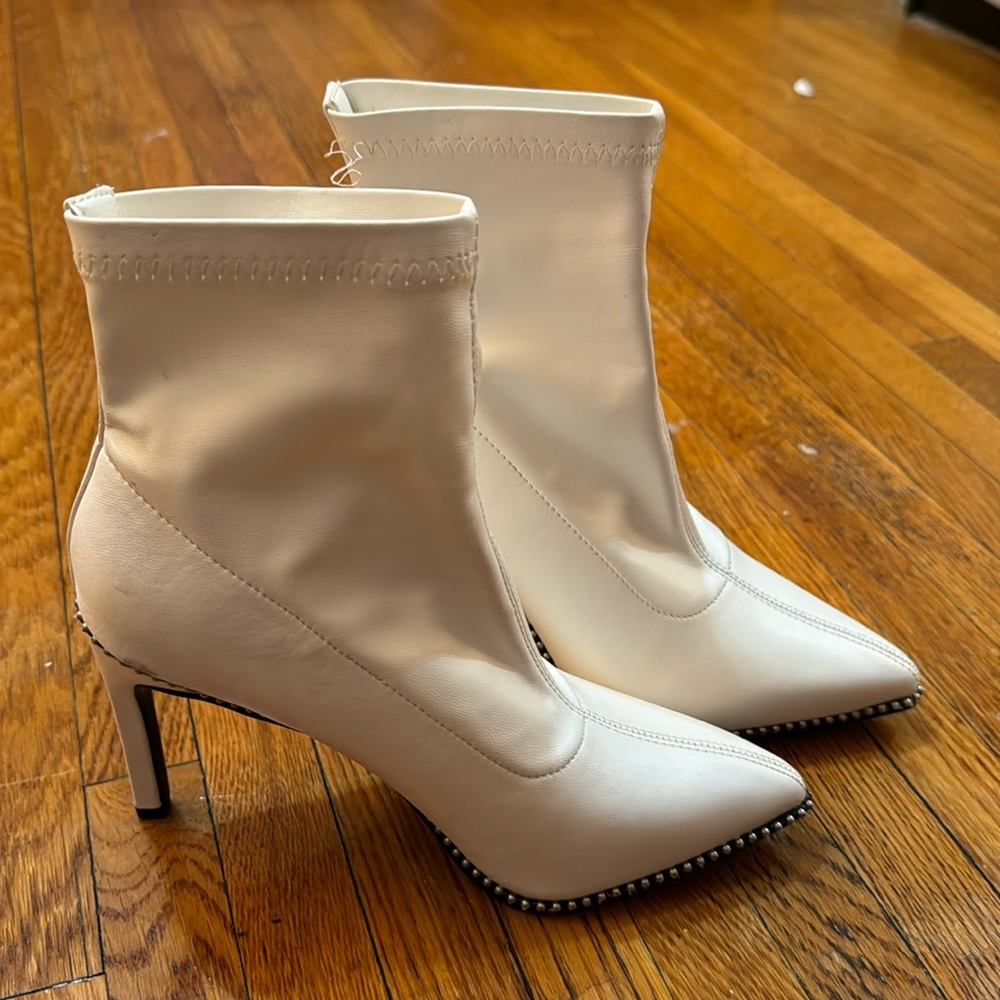 White high-heeled boots